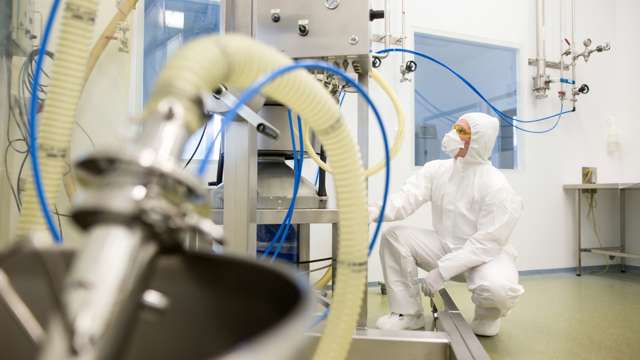 pharma man in safety suit