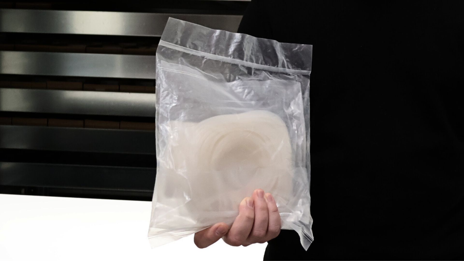 Person holds Platinum Cleanroom hose